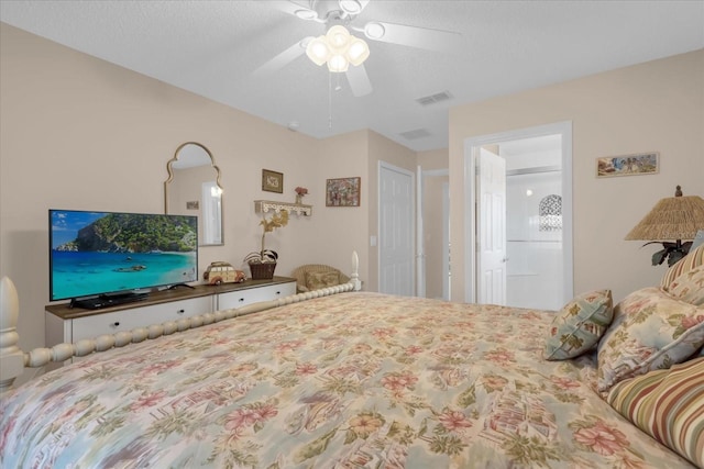 bedroom featuring a textured ceiling and ceiling fan