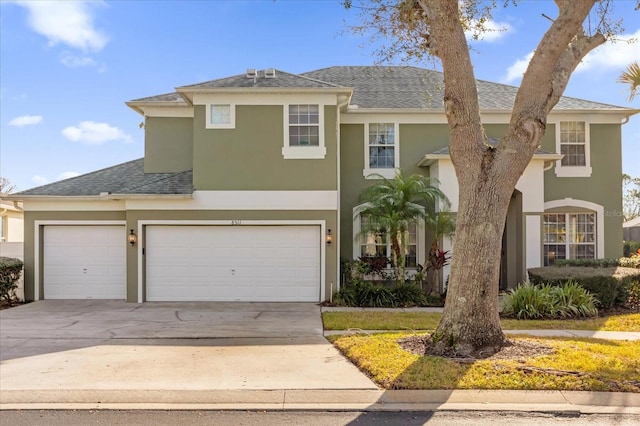 view of front of home with a garage