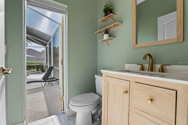 half bathroom with vanity and toilet