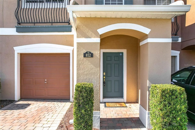 property entrance featuring a garage