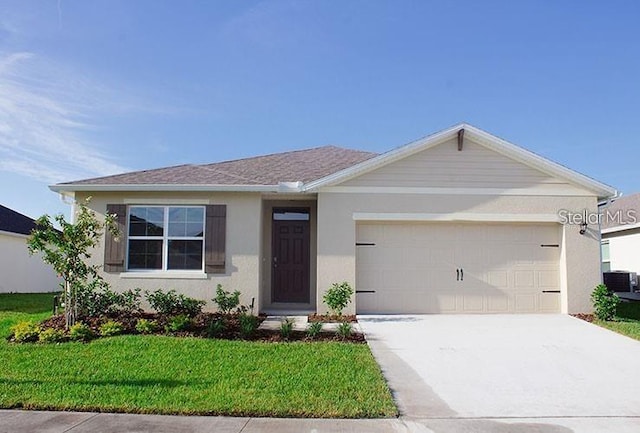 single story home with a garage, a front lawn, and central AC unit