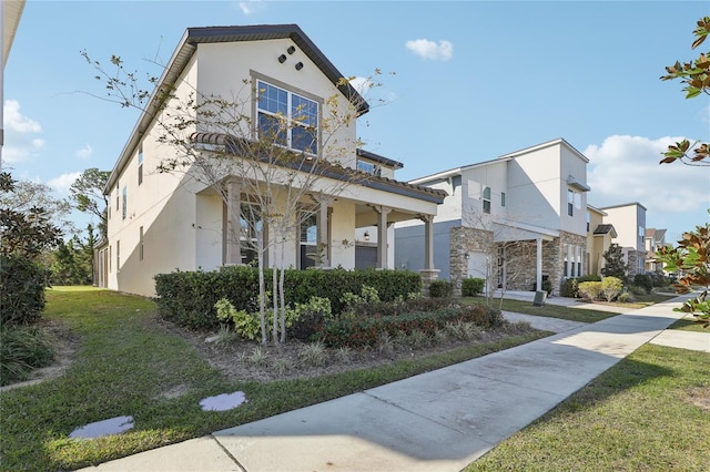 view of front of home with a front yard