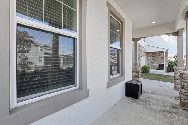 view of patio featuring a porch