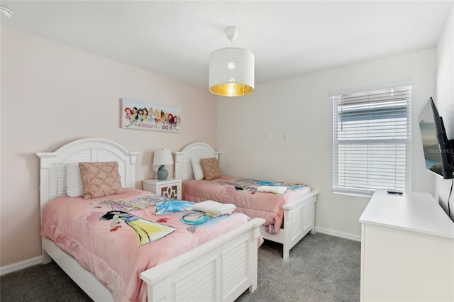 bedroom featuring light colored carpet