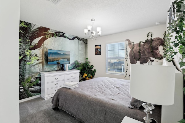 bedroom with dark colored carpet, a textured ceiling, and a notable chandelier