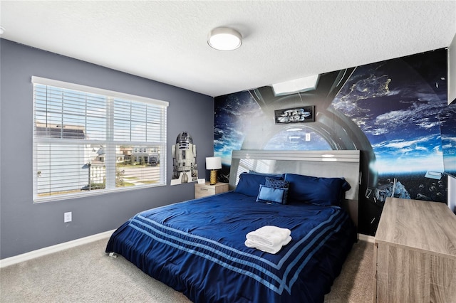 bedroom with carpet and a textured ceiling