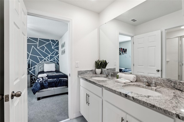 bathroom featuring vanity and walk in shower