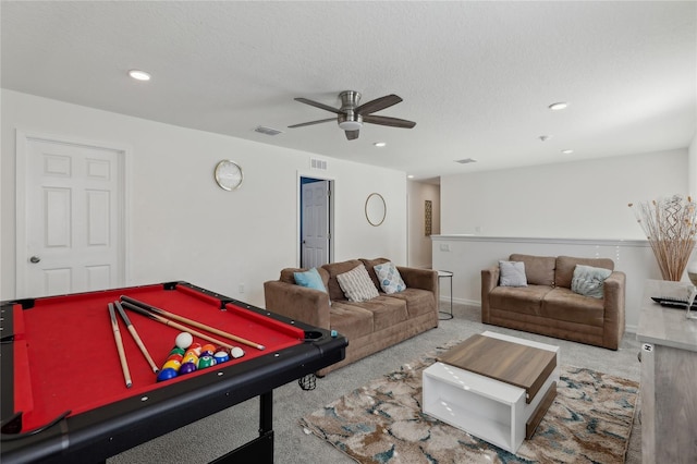 playroom with ceiling fan, a textured ceiling, carpet floors, and pool table