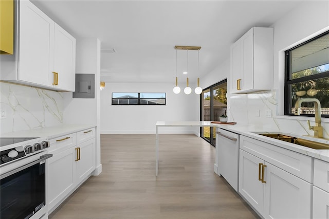 kitchen with white cabinetry, dishwasher, sink, stainless steel range with electric stovetop, and hanging light fixtures