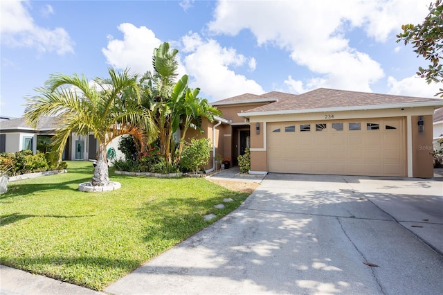 view of front facade with a garage and a front yard