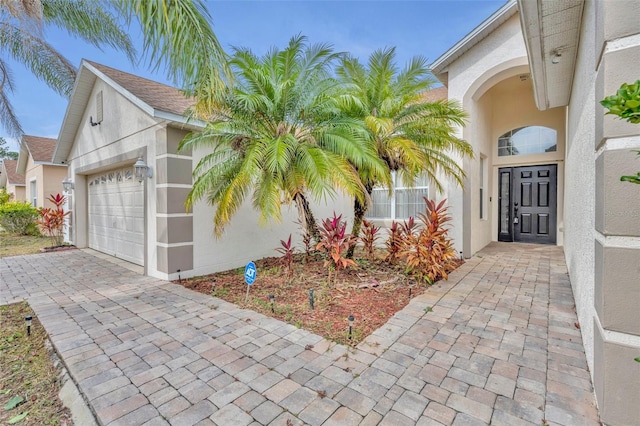 property entrance featuring a garage