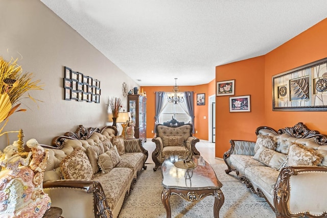 living room featuring an inviting chandelier and a textured ceiling