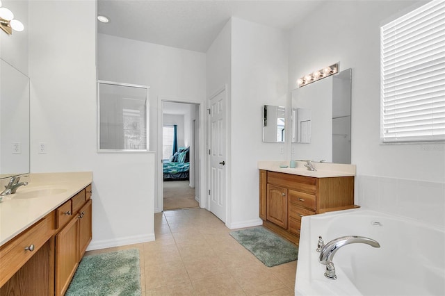 bathroom with tile patterned floors, vanity, and plus walk in shower