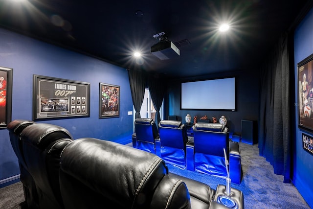 cinema room featuring carpet floors