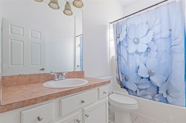 full bathroom featuring shower / bath combo, toilet, tile patterned floors, and vanity