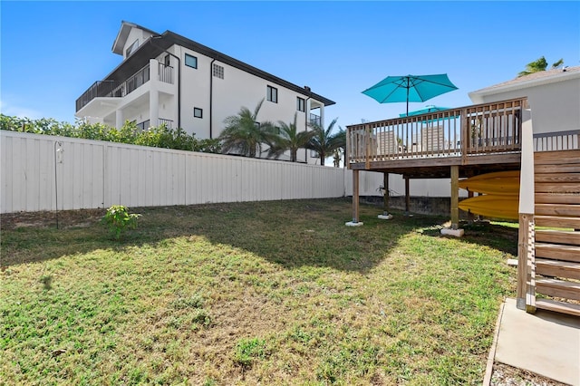 view of yard with a deck