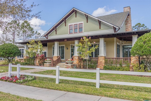 craftsman inspired home featuring covered porch