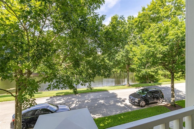 view of patio with a water view