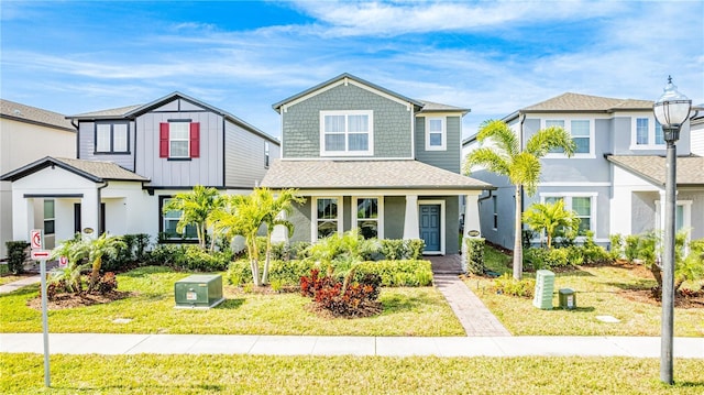 view of front facade featuring a porch and a front yard