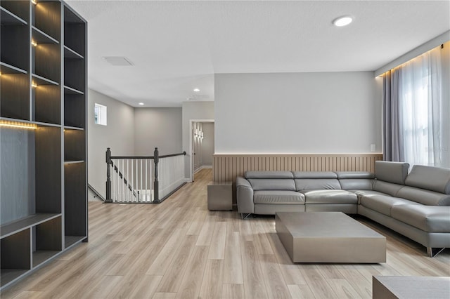 living room with light hardwood / wood-style floors