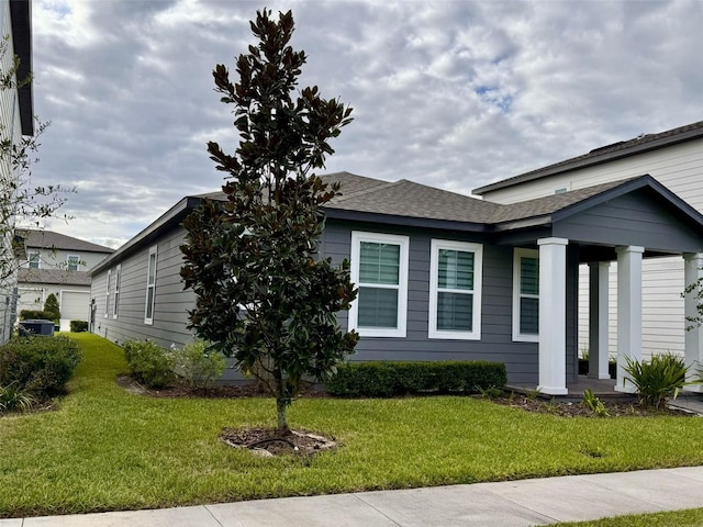 view of home's exterior featuring a yard