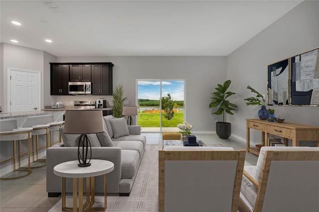 living room featuring light tile patterned floors