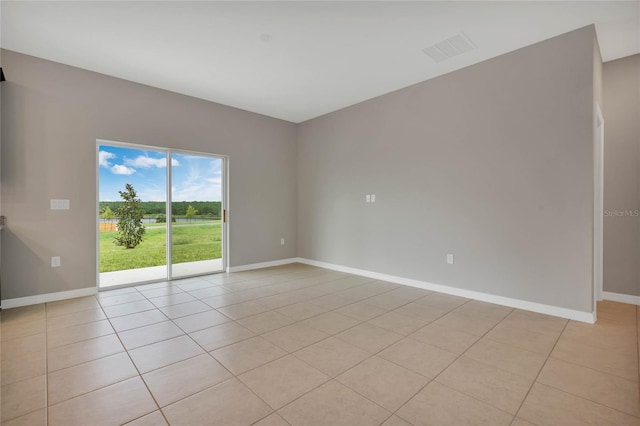 empty room featuring light tile patterned floors