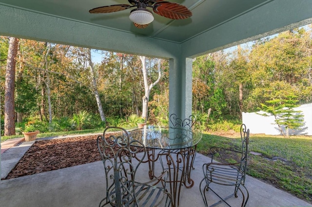 view of patio featuring ceiling fan