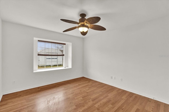 unfurnished room with light hardwood / wood-style flooring and ceiling fan