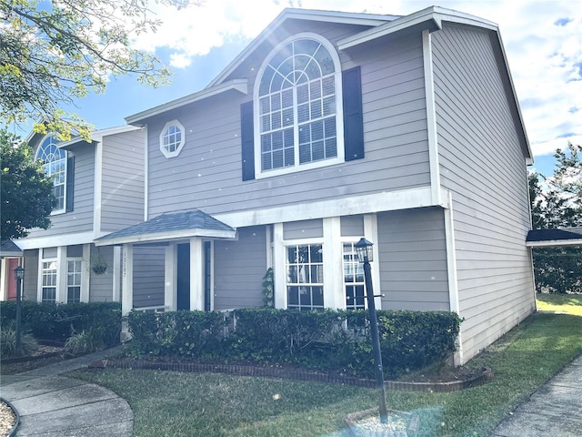 view of front of house with a front lawn