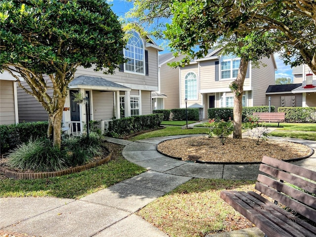 view of front facade with a front lawn