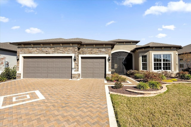 prairie-style house with a garage and a front yard