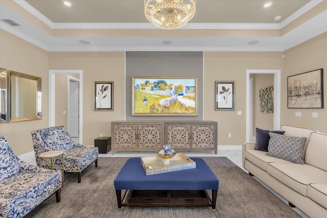 living room with a notable chandelier, a raised ceiling, and crown molding