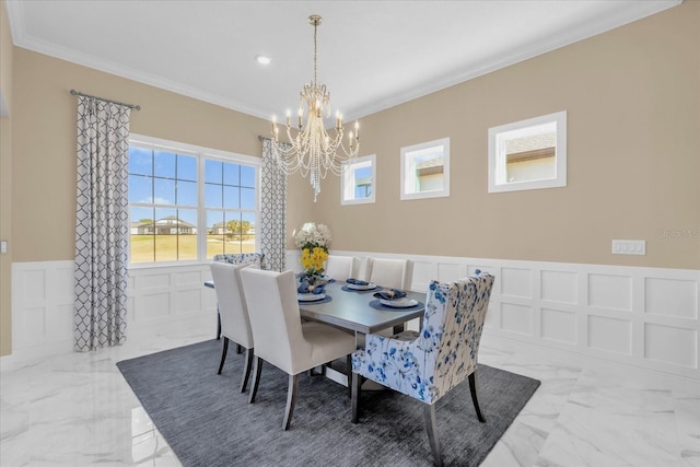 dining room featuring an inviting chandelier and ornamental molding