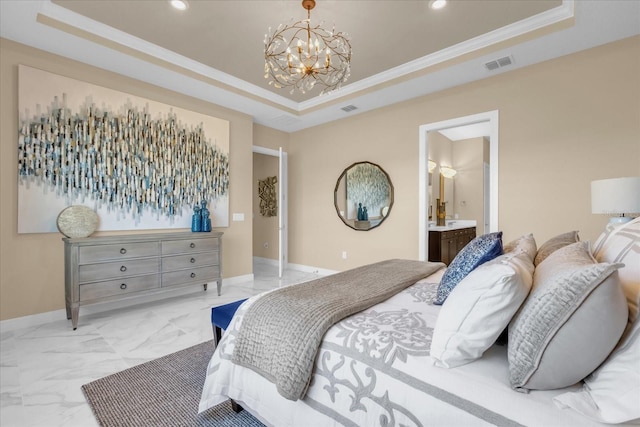 bedroom with ensuite bathroom, a raised ceiling, crown molding, and an inviting chandelier