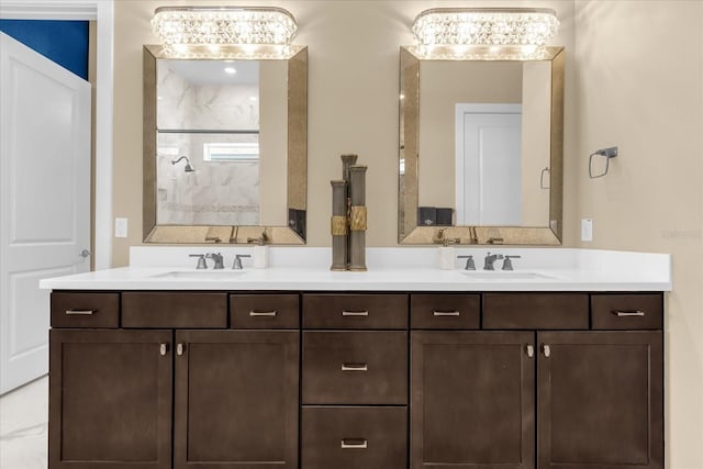 bathroom with a shower and vanity