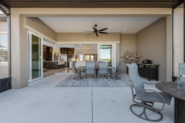 view of patio with ceiling fan