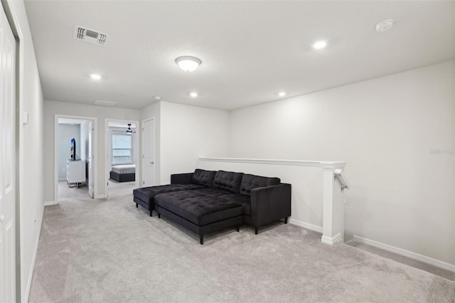 living room with light colored carpet