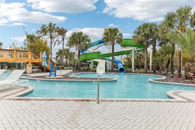 view of pool featuring a water slide