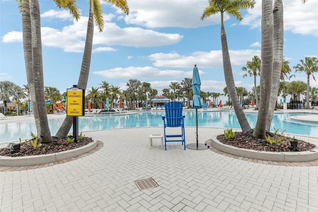 view of swimming pool featuring a patio