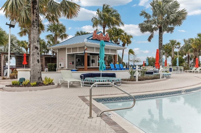 view of pool with a patio