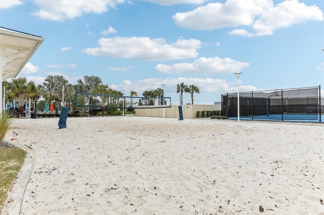 view of home's community featuring volleyball court