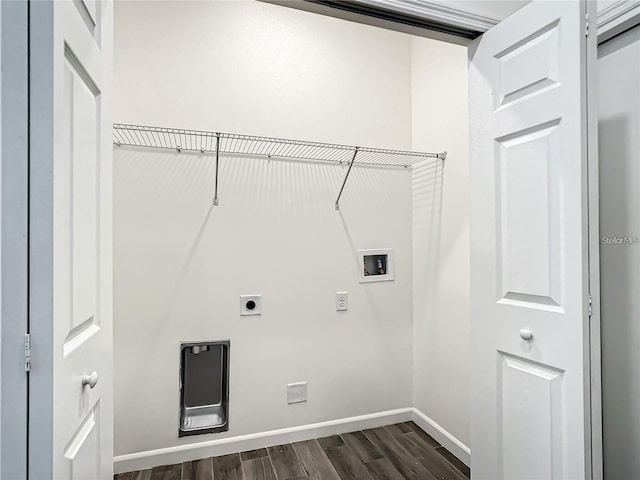 laundry room with electric dryer hookup, dark wood-type flooring, and washer hookup