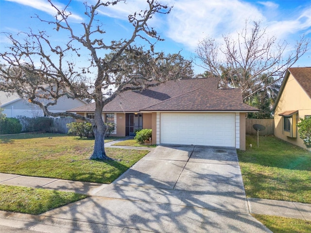 ranch-style home with a front yard and a garage