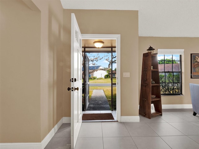 view of tiled foyer entrance