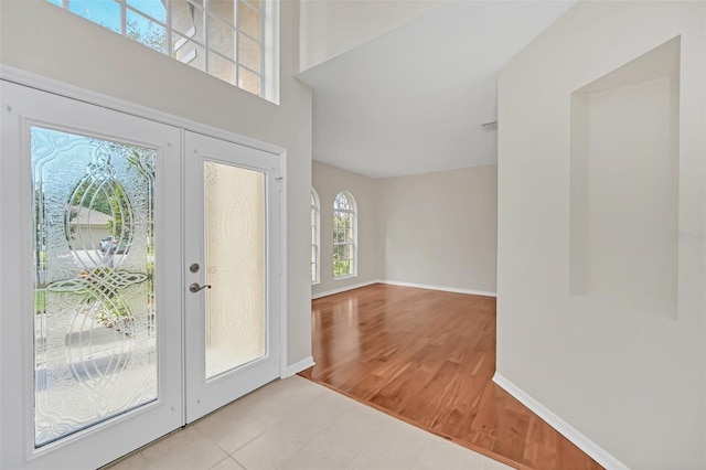 tiled foyer with french doors