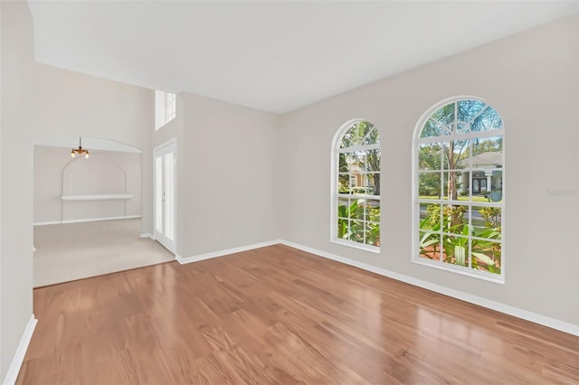 unfurnished room featuring wood-type flooring