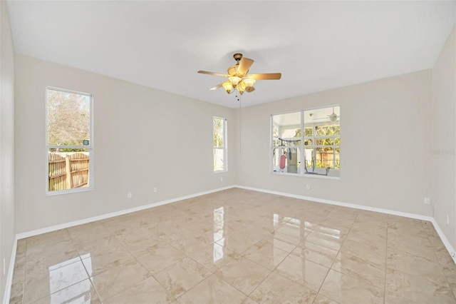 spare room featuring ceiling fan