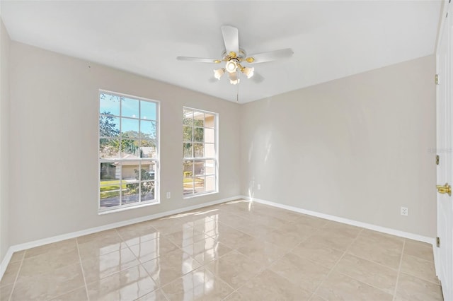 unfurnished room featuring ceiling fan