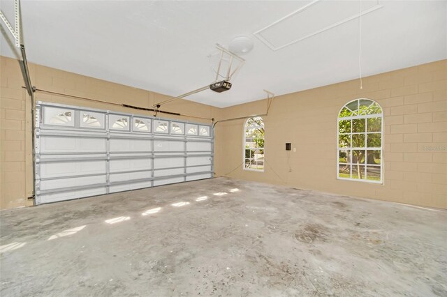 garage featuring a garage door opener